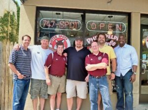 keith and jim with UM football players